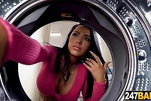 Latina Housewife doing laundry